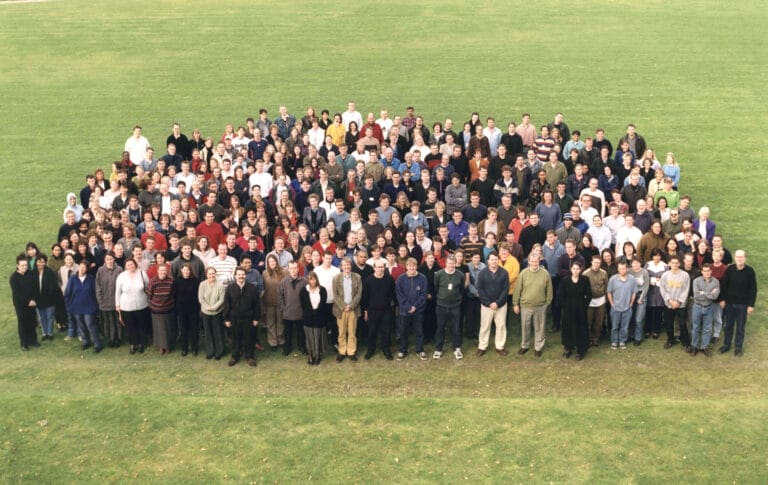 Picture of a large group of people that were involved in the Human Genome Project
