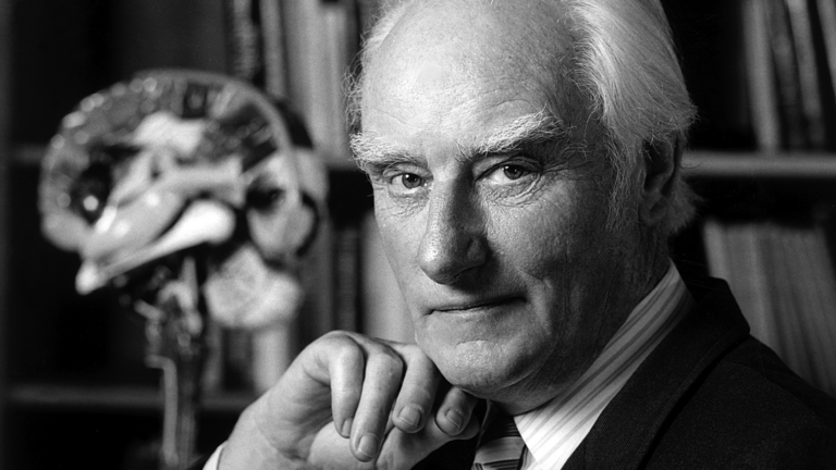 Picture of Francis Crick looking into the camera.