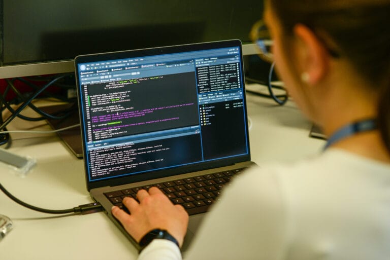 Image of someone on a laptop looking at sequencing.
