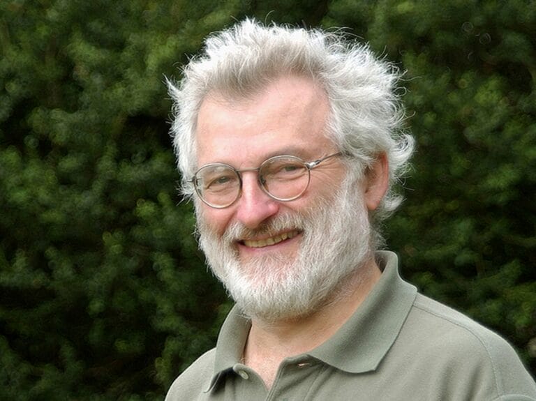 John Sulston smiling into the camera