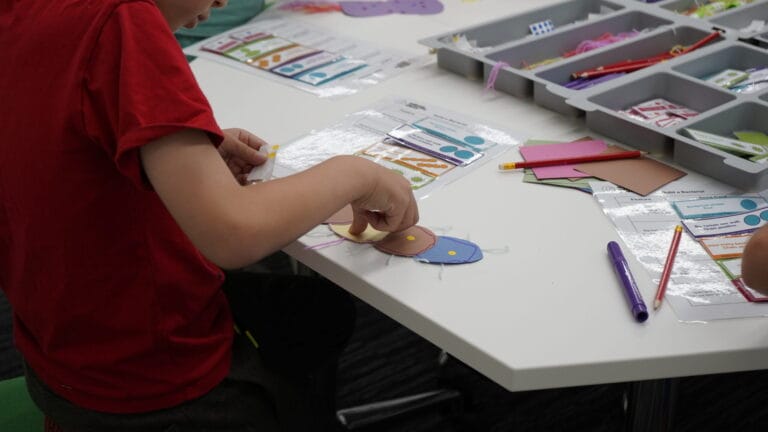 child taking part in the activity guide
